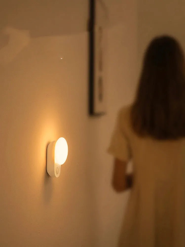 White Baseus Sunshine Series Full Moon rechargeable sensor bedside night light.