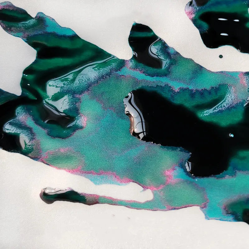 Bottle of strong sheen gradient colour fountain pen ink with gold powder particles in red tide or truffle colour