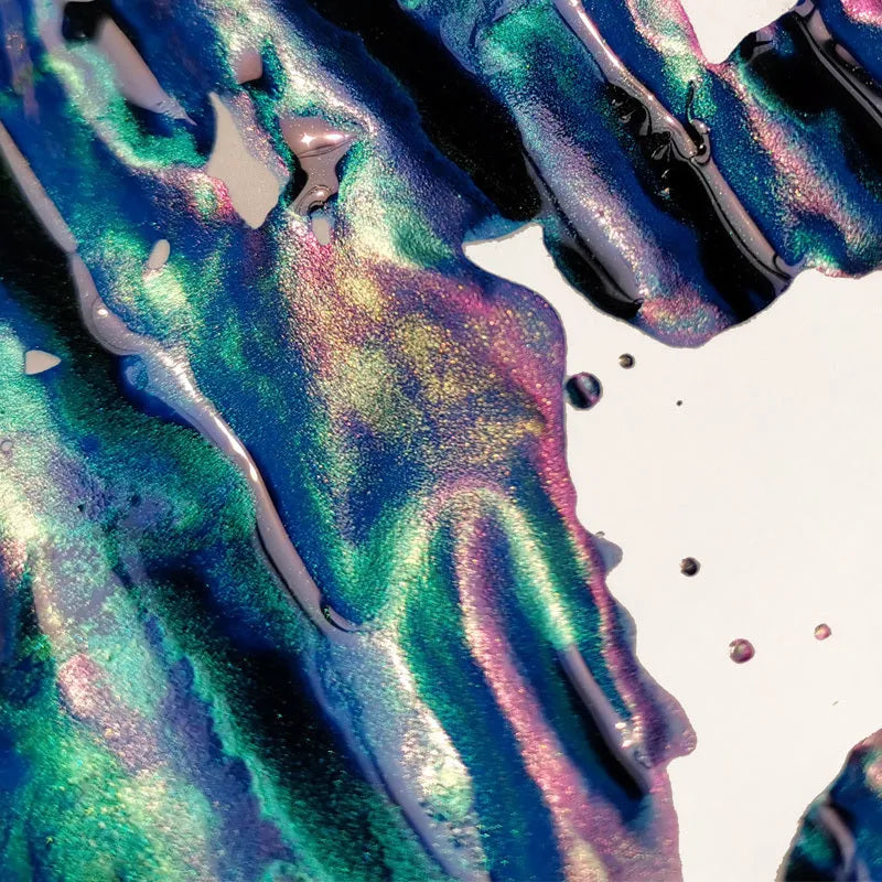 Bottle of strong sheen gradient colour fountain pen ink with gold powder particles in red tide or truffle colour