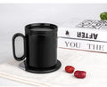 Black wireless charging warm cup showing 110mm diameter coaster with beverage and smartphone charging simultaneously