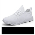Men's black and white mesh sneakers with round toe and lace-up closure