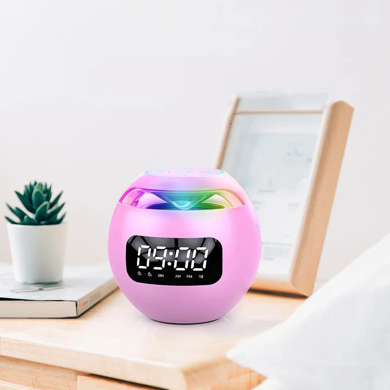 Mini ball card Bluetooth speaker in pink with colourful light display and clock on top panel