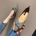 Women's pointed toe shallow mouth single shoes in black and red colours showing low heel design