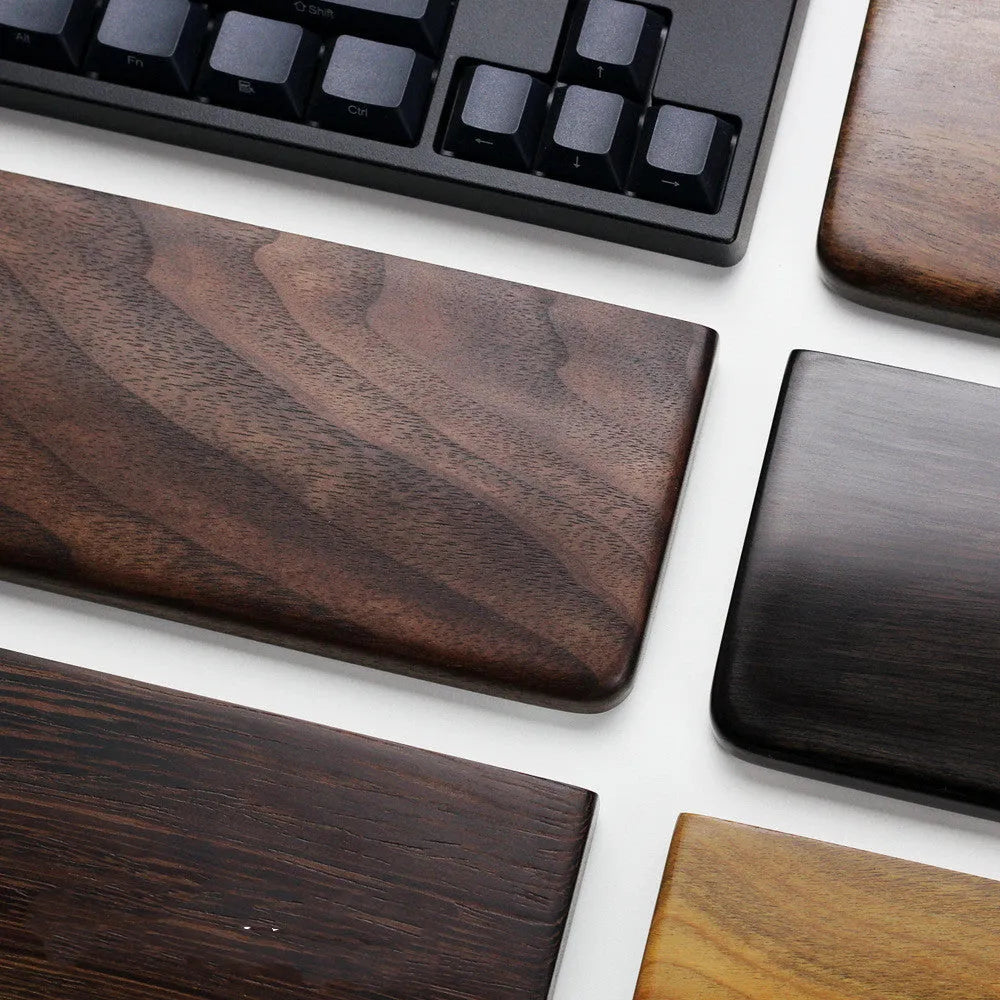 Black walnut wood keyboard wrist rest measuring 30cm long for 60% mechanical keyboards