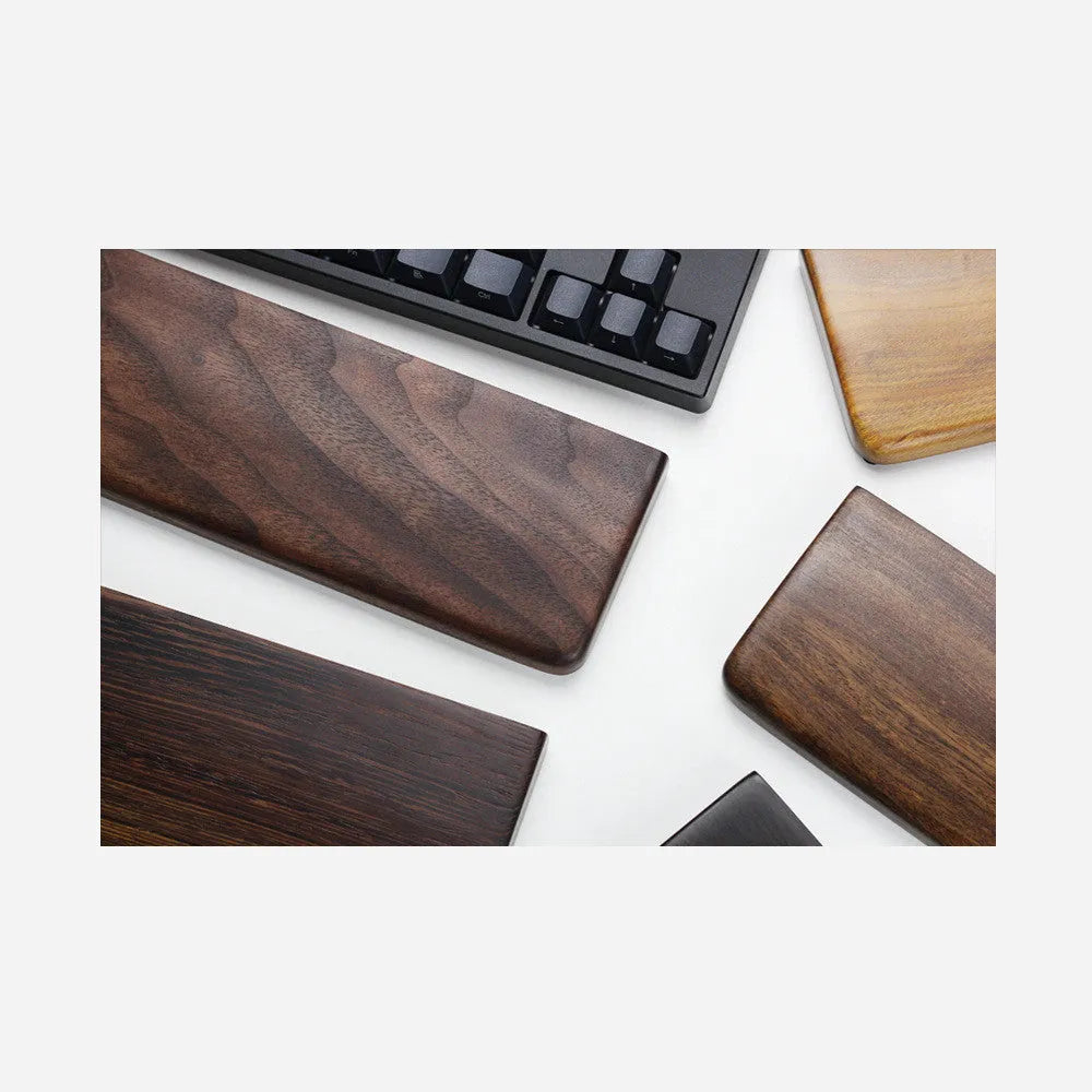 Black walnut wood keyboard wrist rest measuring 30cm long for 60% mechanical keyboards
