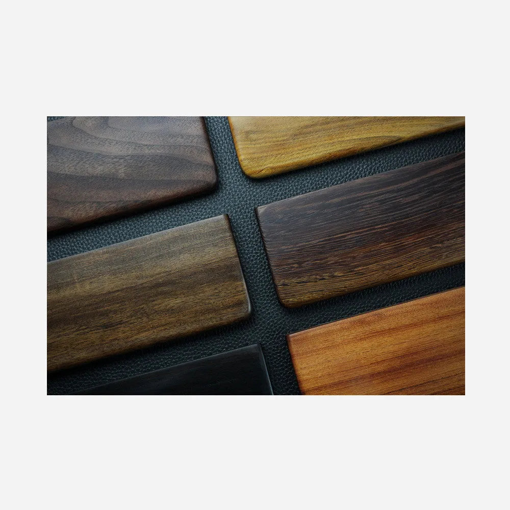 Black walnut wood keyboard wrist rest measuring 30cm long for 60% mechanical keyboards