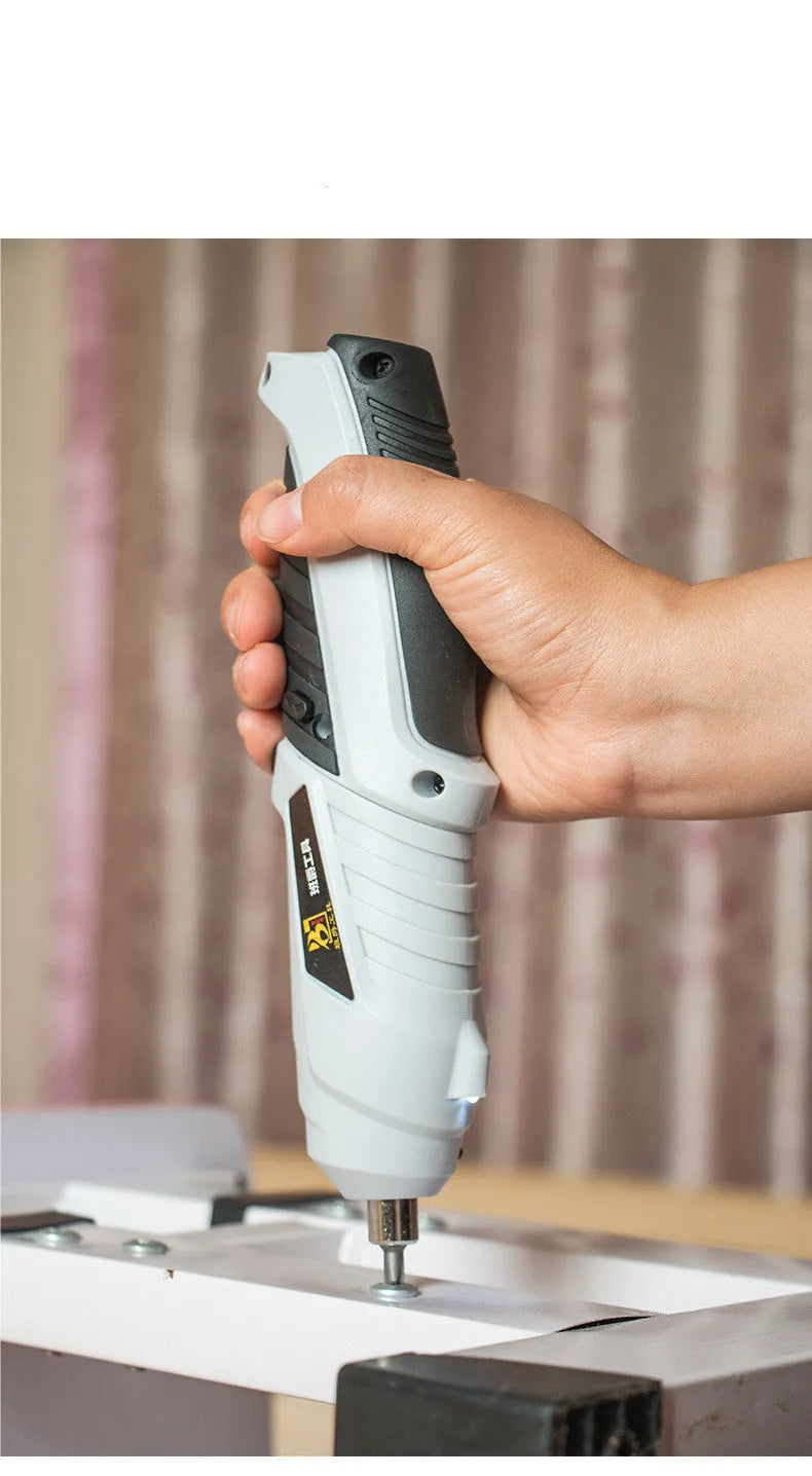 Black rechargeable lithium battery screwdriver with pistol grip and USB charging cable for furniture assembly.