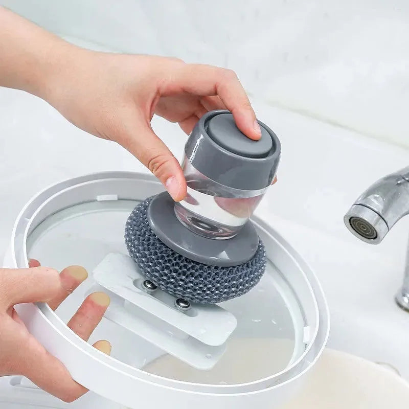 Kitchen palm scrubber with push-type soap dispenser for cleaning stoves and sinks