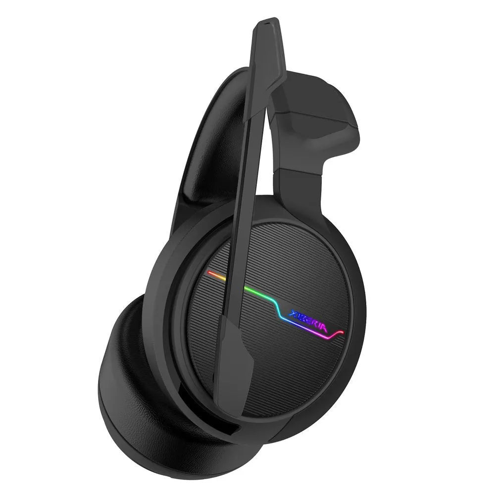Siberian V20 black gaming headset with 50mm speakers and 7 colour light vibration on a desk
