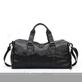 Large black waterproof PU leather sports training bag with shoulder strap and multiple internal pockets.