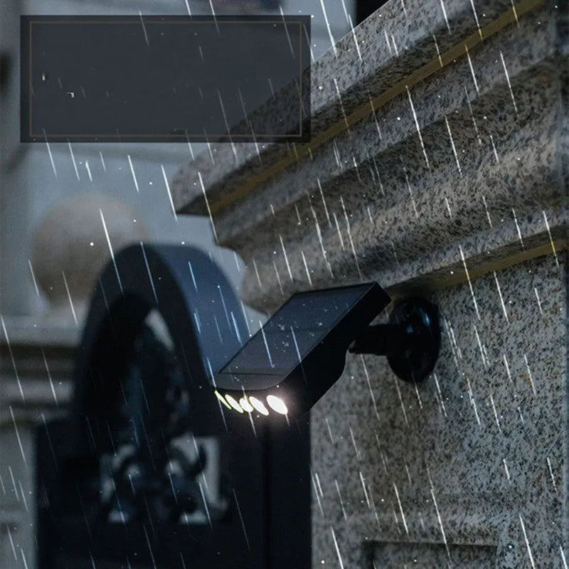 Black solar-powered motion sensor wall lamp mounted on exterior wall