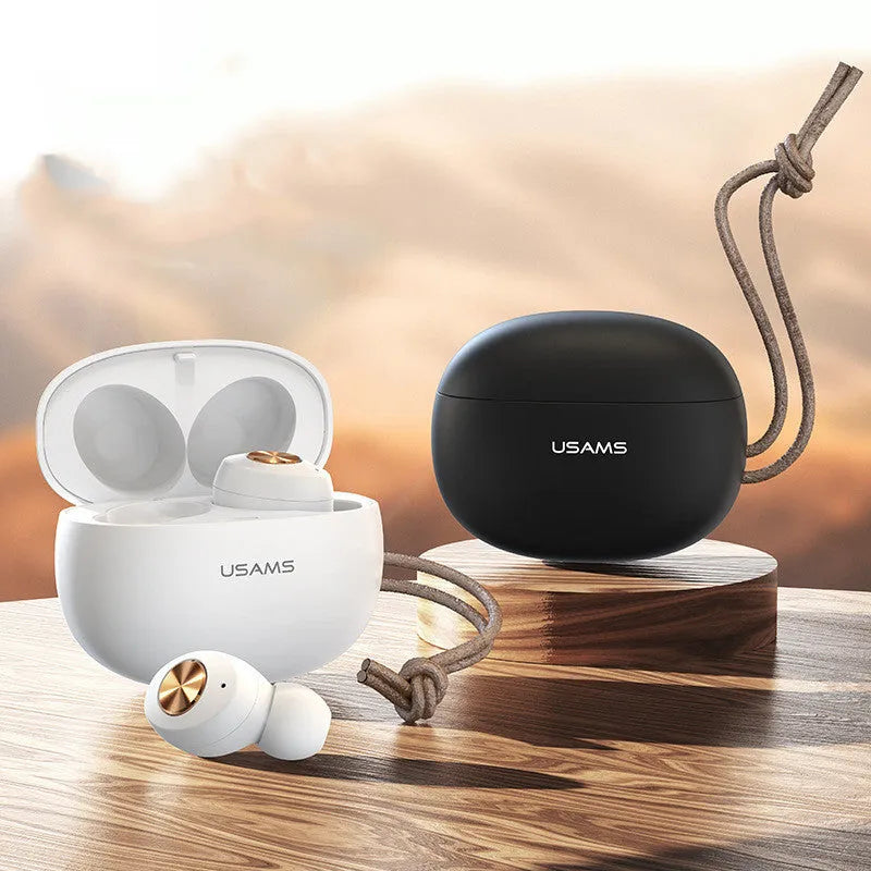 Compact black Wireless Bluetooth Mini TWS earbuds and charging case on a white background.