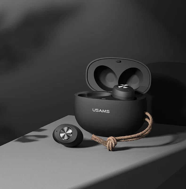 Compact black Wireless Bluetooth Mini TWS earbuds and charging case on a white background.