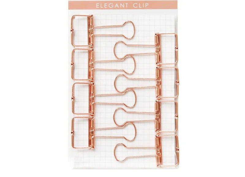 Rose gold metal binder set showing small and large folders for ticket and document organisation.