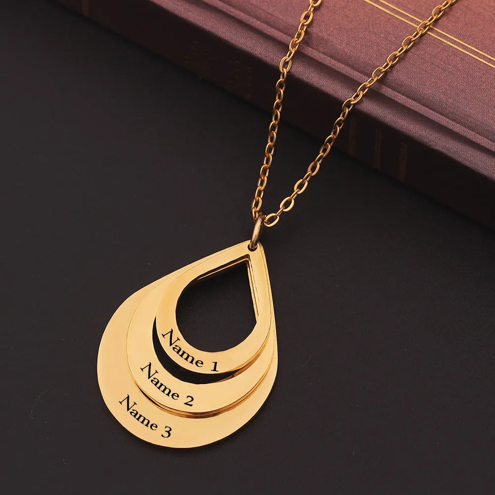 Custom engraved stainless steel pendant necklace with three water droplet design in gold, silver, and rose gold