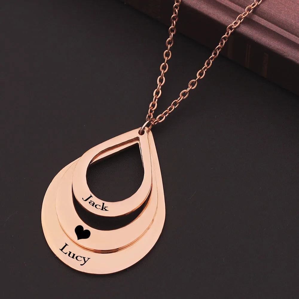 Custom engraved stainless steel pendant necklace with three water droplet design in gold, silver, and rose gold