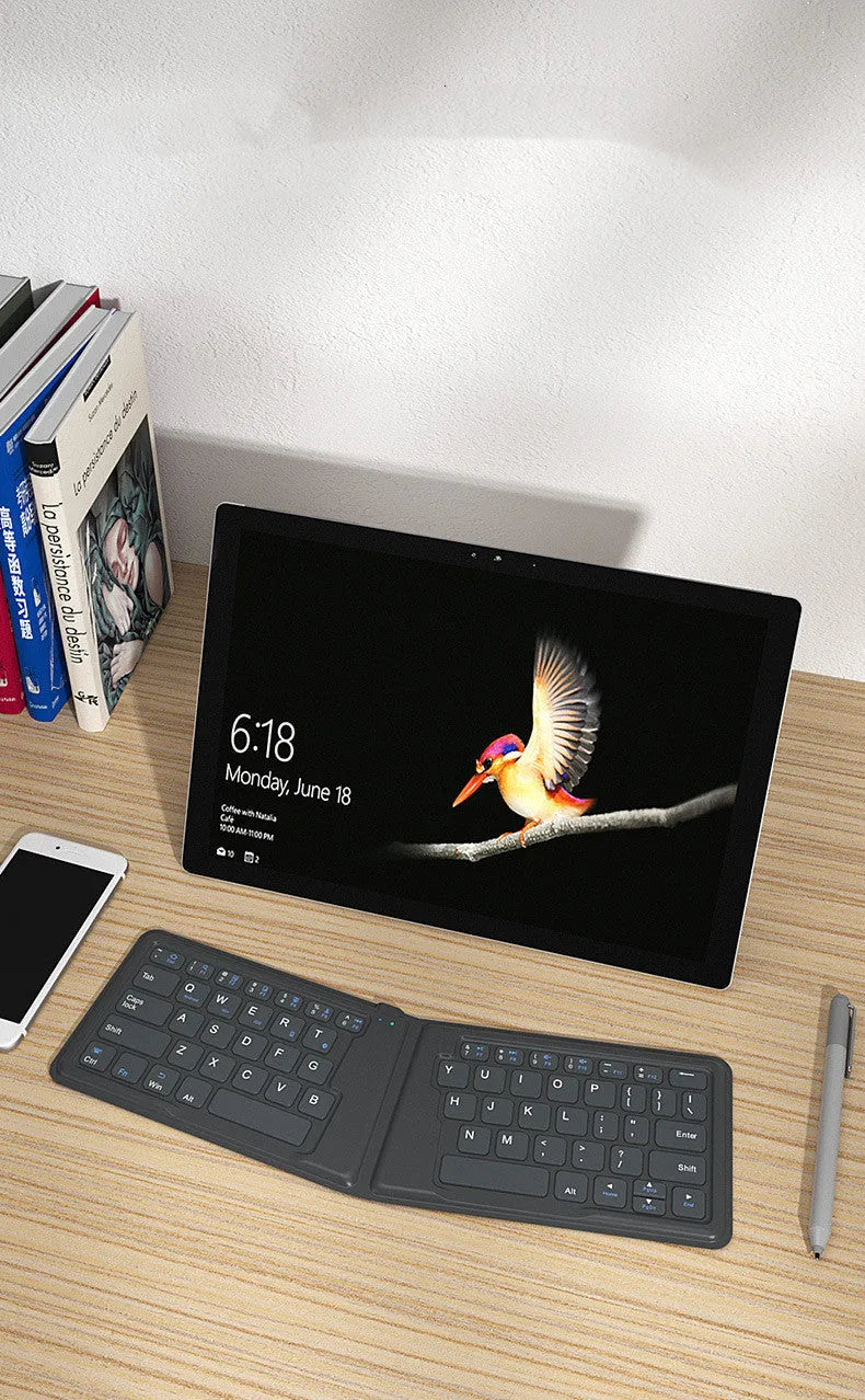 Folding Bluetooth keyboard compatible with Apple devices, 64 keys, ABS material, USB rechargeable, style A 166 degree version