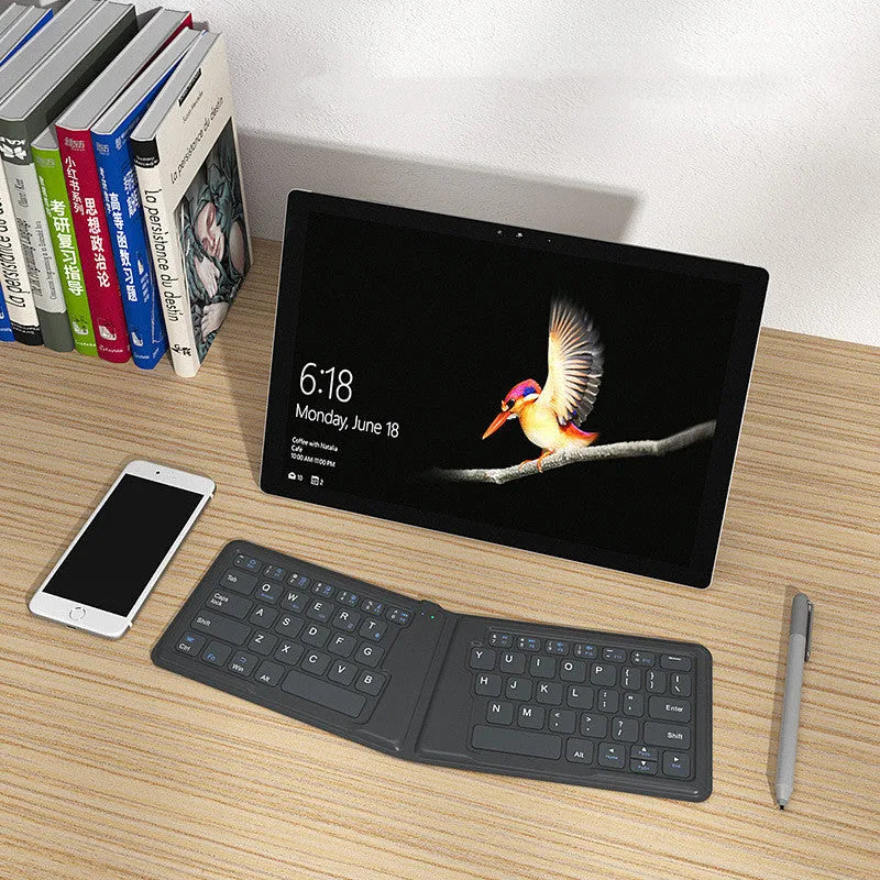 Folding Bluetooth keyboard compatible with Apple devices, 64 keys, ABS material, USB rechargeable, style A 166 degree version