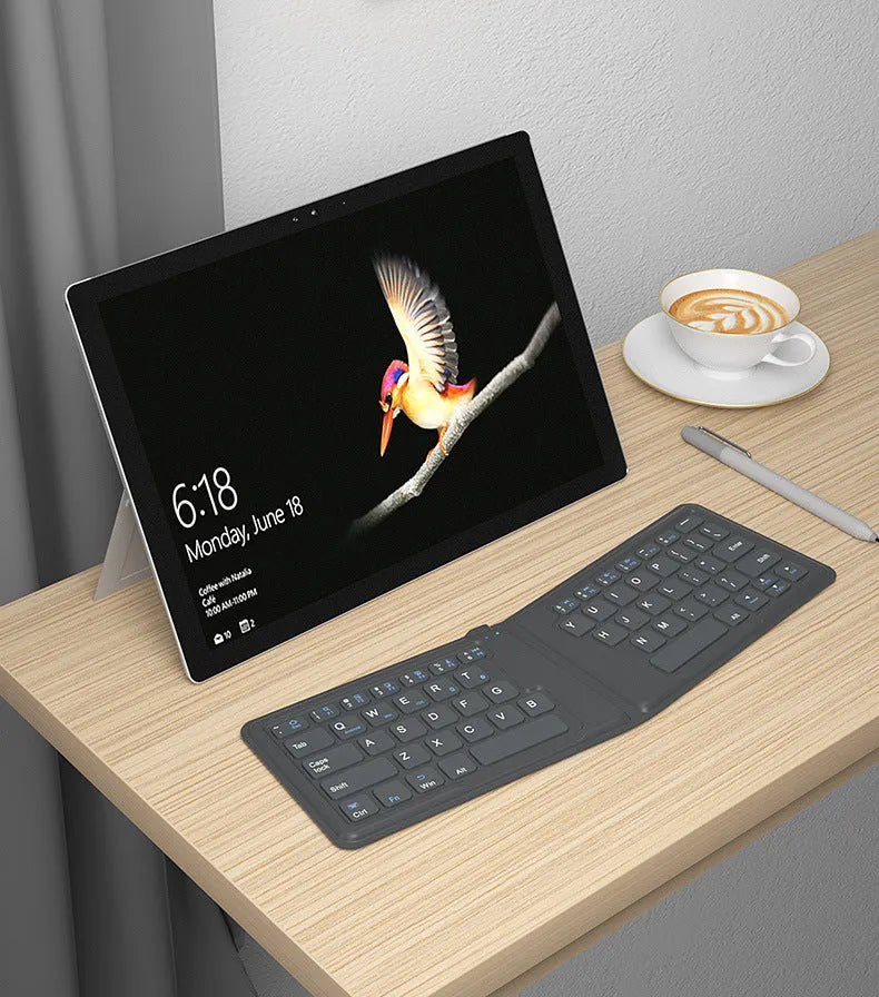 Folding Bluetooth keyboard compatible with Apple devices, 64 keys, ABS material, USB rechargeable, style A 166 degree version