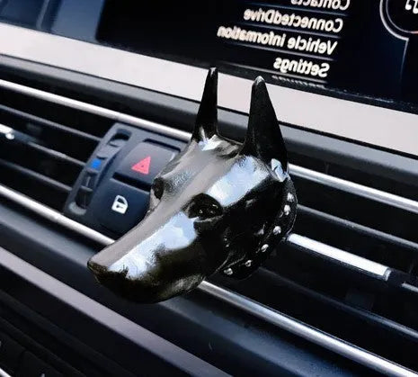 Doberman-shaped car air freshener solid diffuser vent clip in black colour on car air vent