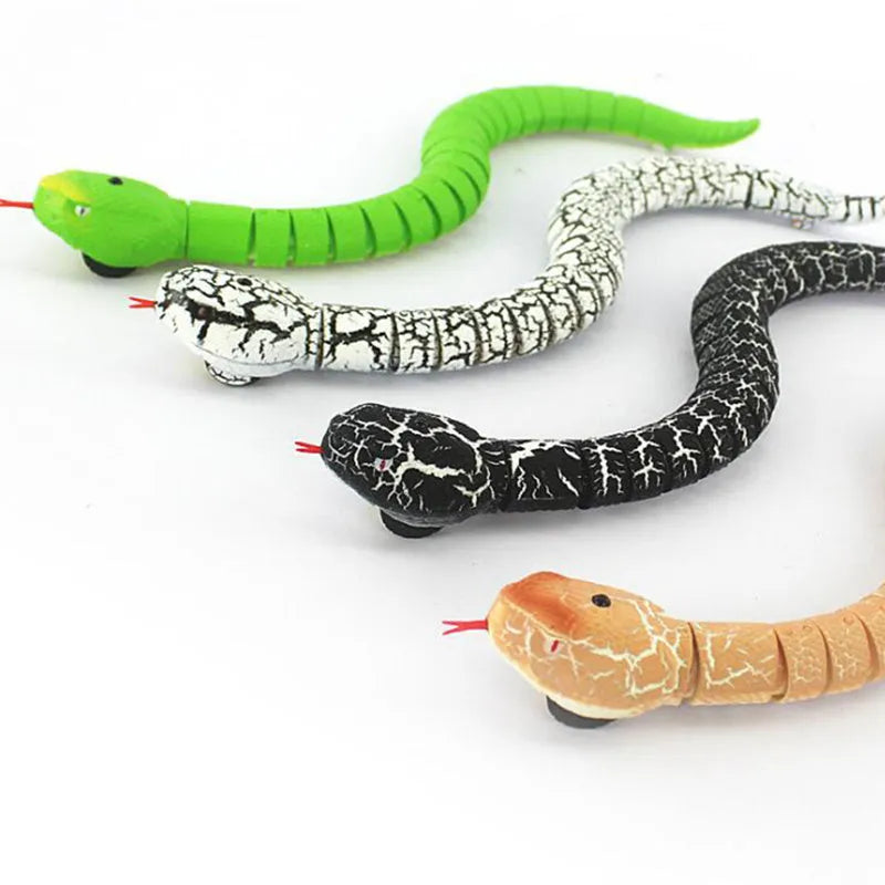 Remote control snake toy with black and grey cobra pattern, showing crawling movement and twelve-button remote control