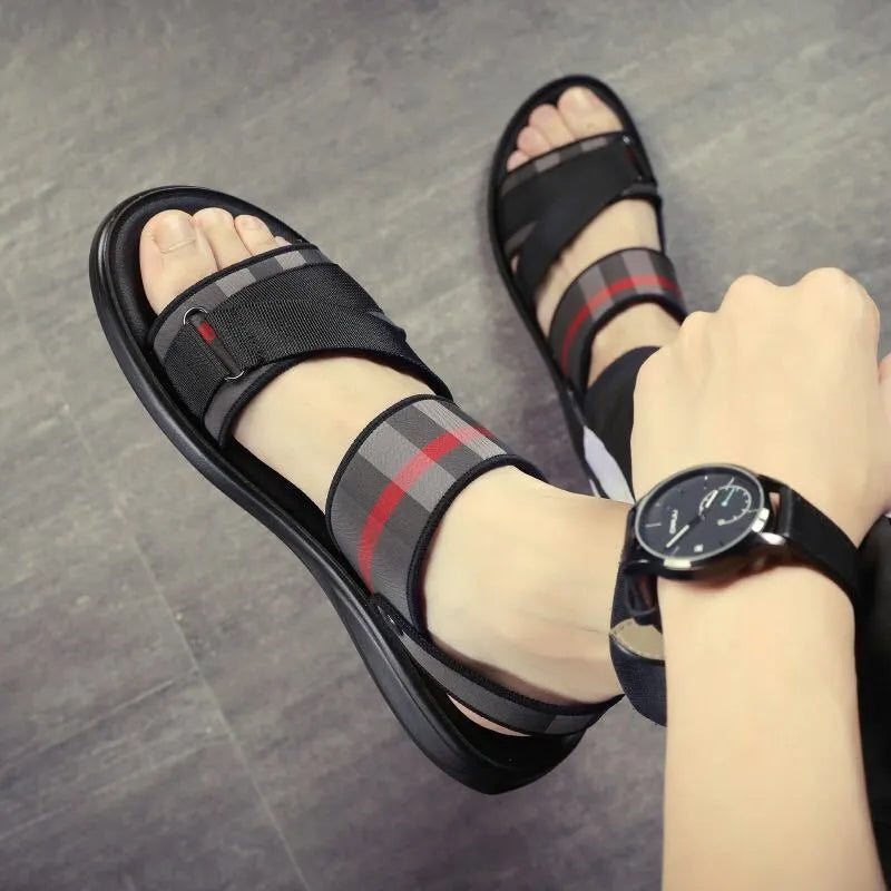 A pair of youth leisure sports sandals with a blue Lycra upper and a light polyurethane sole.