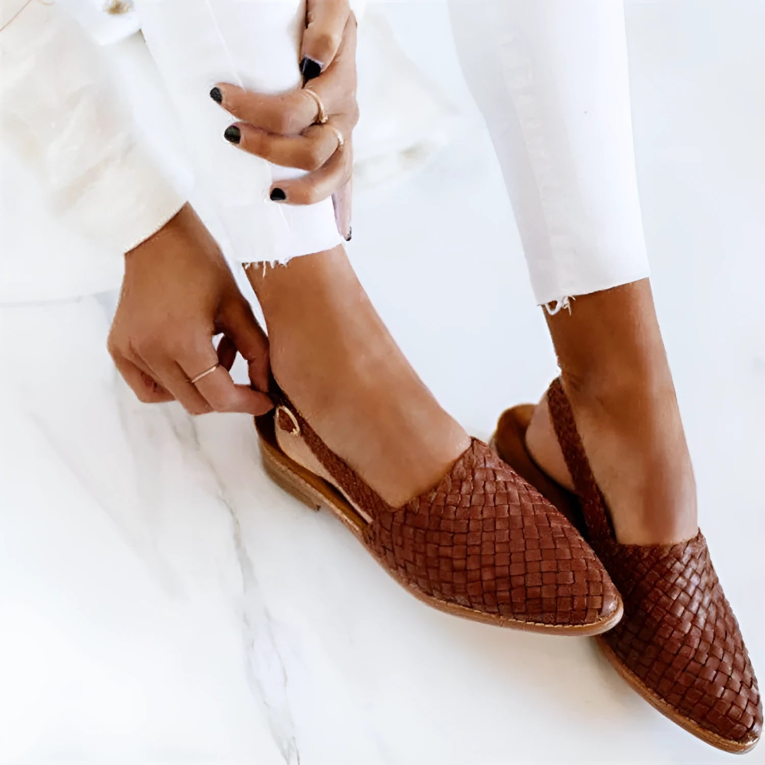 Baotou flat sandals with a buckle strap and pointed toe in multiple colour options.