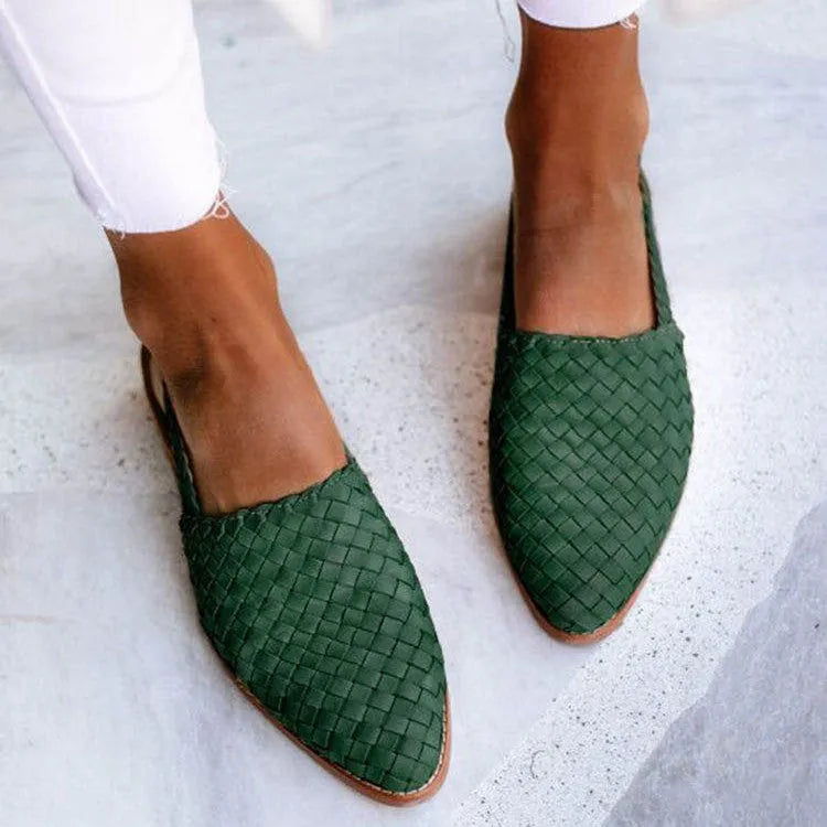 Baotou flat sandals with a buckle strap and pointed toe in multiple colour options.