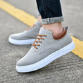 Men's high-top canvas sneakers in black with white sole and back-tie laces, size 46-47