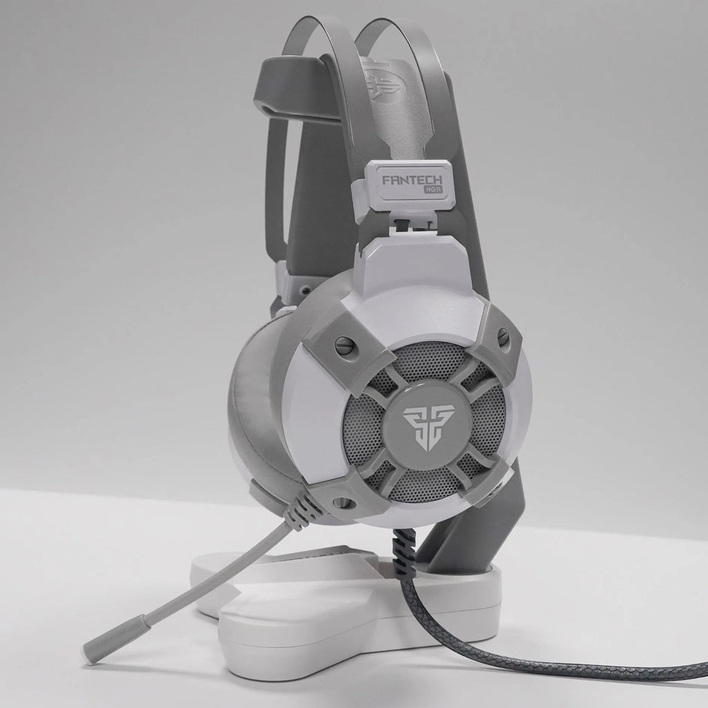 Black FANTECH HG11 USB gaming headset with RGB lights on earcups and a noise-cancelling microphone.