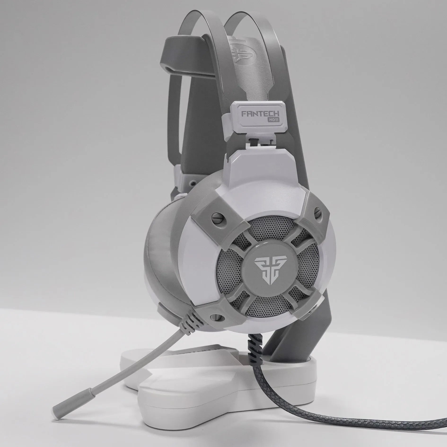 Black FANTECH HG11 USB gaming headset with RGB lights on earcups and a noise-cancelling microphone.