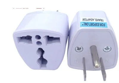 Multi-country travel adapter plug converts UK, US, EU, Australian and German plugs for international use