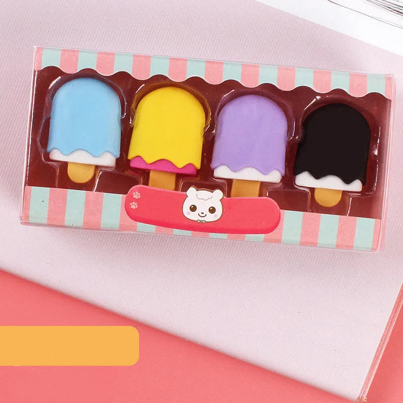 Assortment of 12 colourful cartoon food shaped pencil erasers including ice cream cones, donuts, and lollipops.