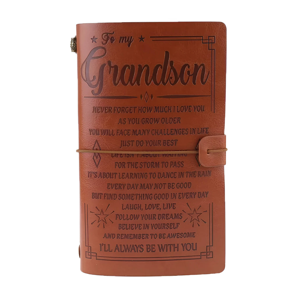 Brown leather hand ledger business notebook with strap binding closed