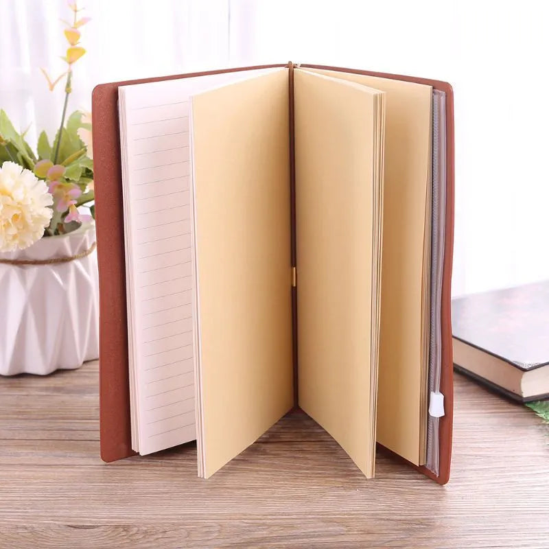 Brown leather hand ledger business notebook with strap binding closed