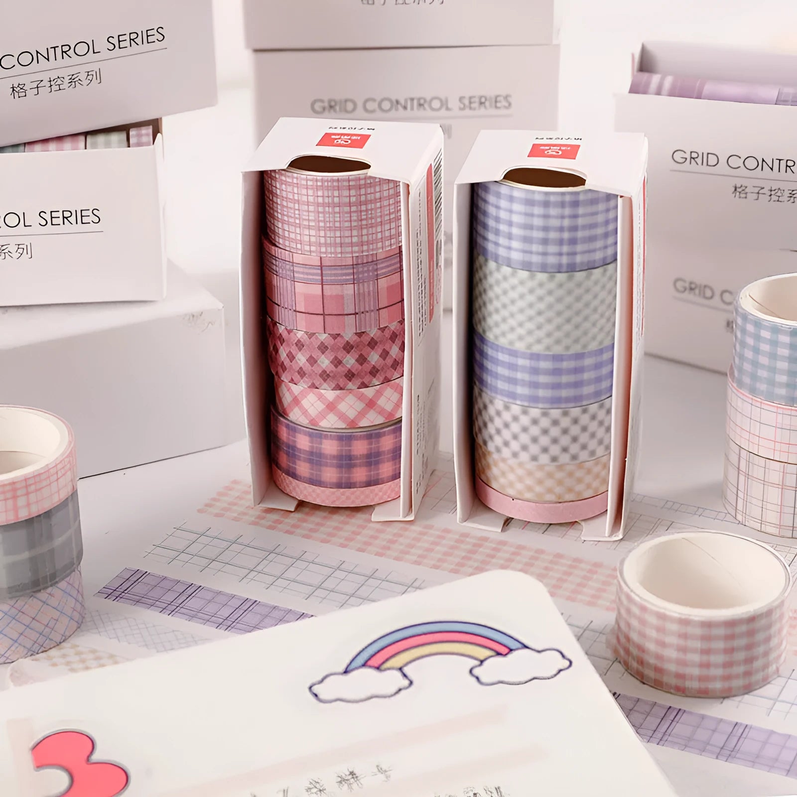 Set of six retro plaid and cute design washi tape rolls for hand account decoration in four different widths.