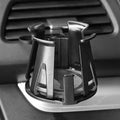 Black ABS car air outlet beverage holder attached to a vehicle air vent showing drink storage