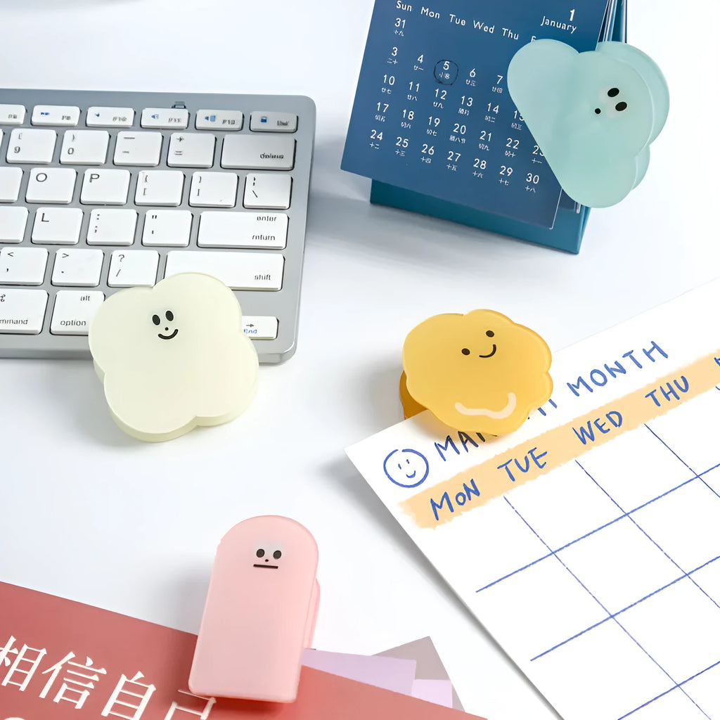 Colourful acrylic cartoon collage clip for paper crafts, shown in beige, blue, orange, and pink.
