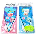 Set of coloured plastic hollow wreath template rulers for drawing and stencilling
