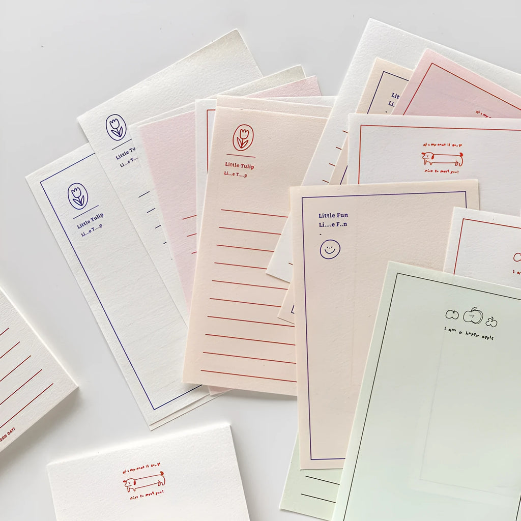 Rectangular memo pad notebook with paper cover compatible with iPhone, showing four colour design options
