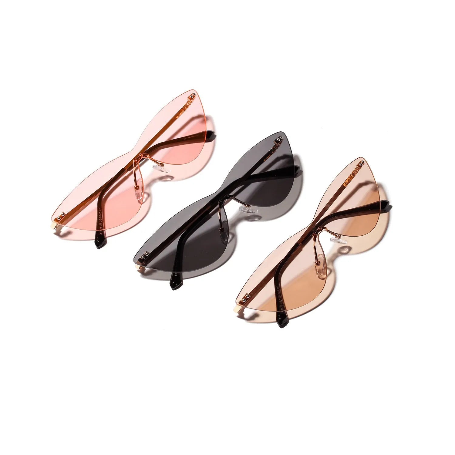 Brown tinted vintage-style sunglasses with a metal frame on a plain background.