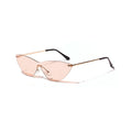 Brown tinted vintage-style sunglasses with a metal frame on a plain background.