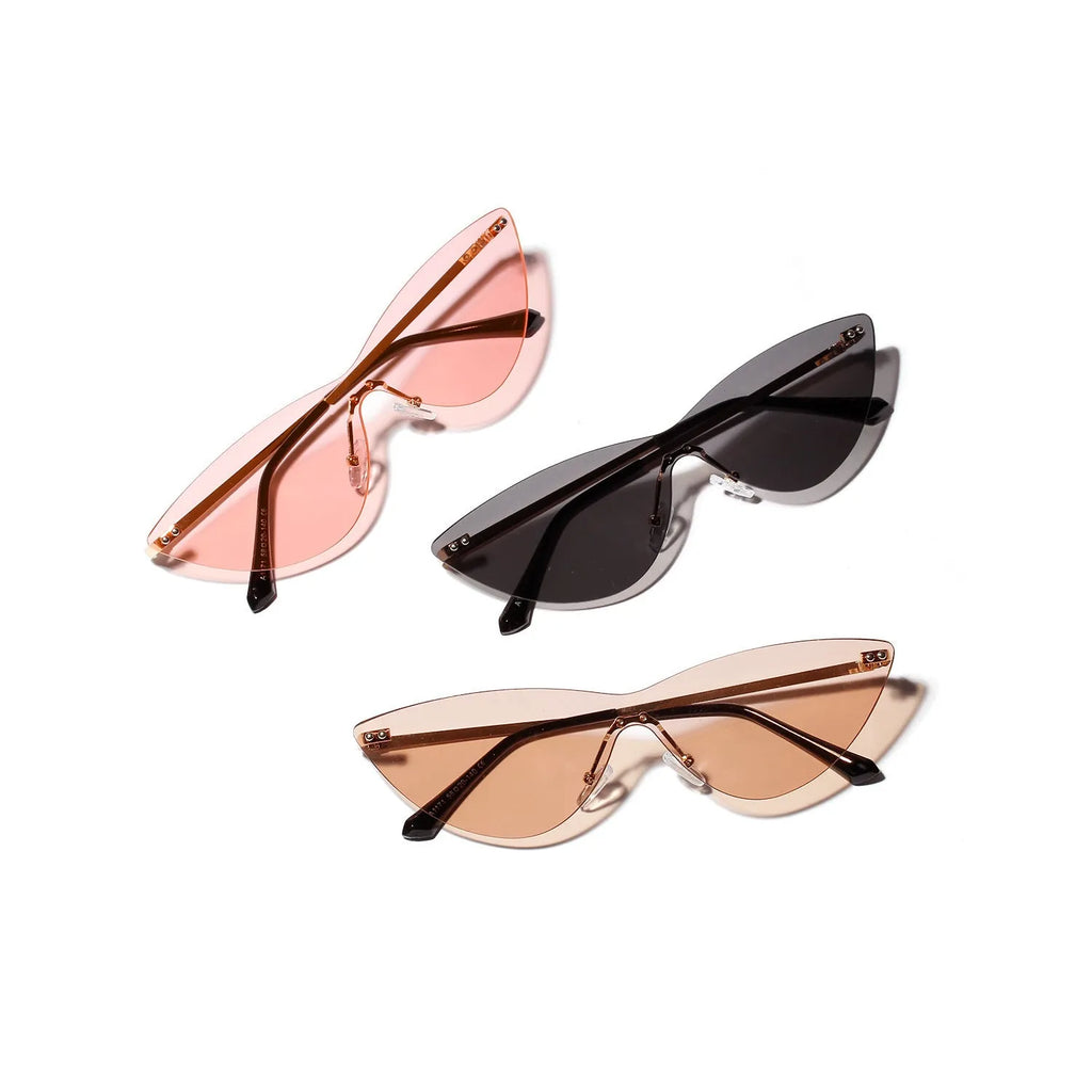 Brown tinted vintage-style sunglasses with a metal frame on a plain background.