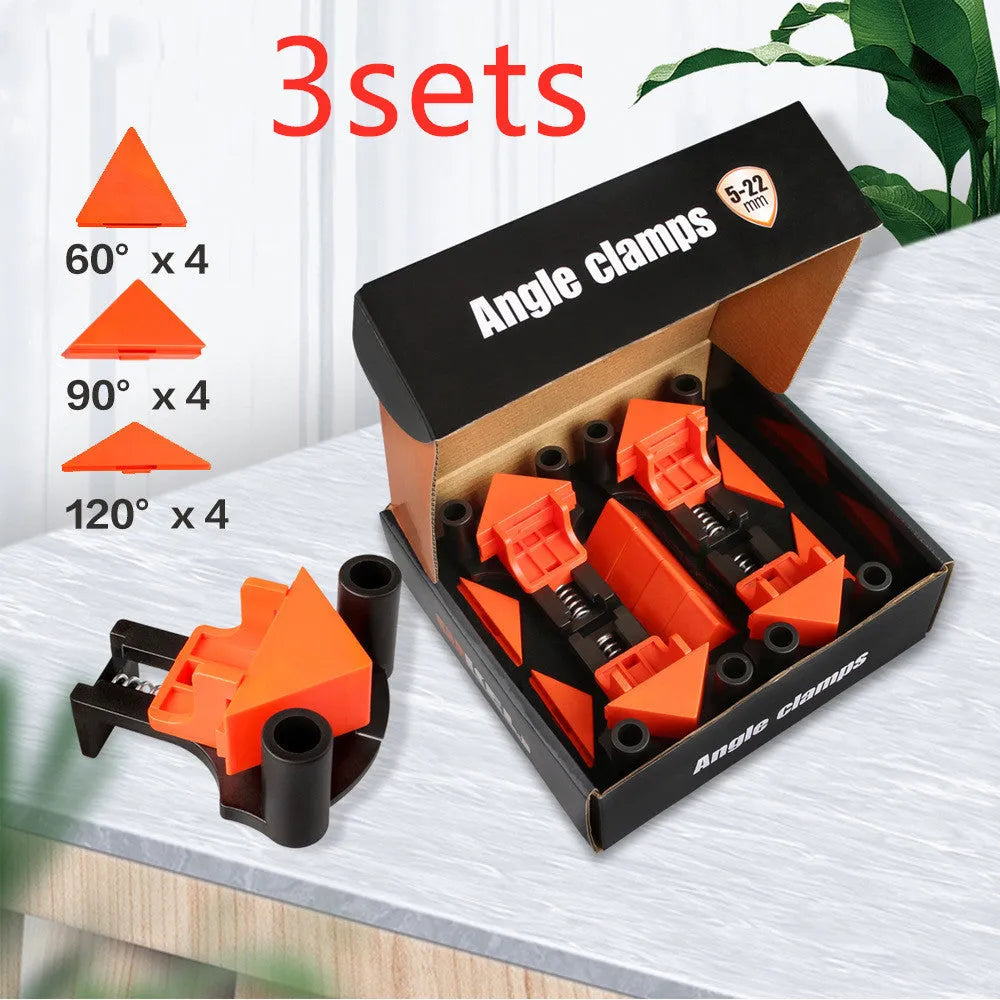 Set of four plastic right-angle clamps for woodworking and picture frame assembly.