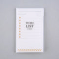 Green PP frosted A6 notebook with tearable pages, shown next to a pen, measuring 13 by 8 cm.