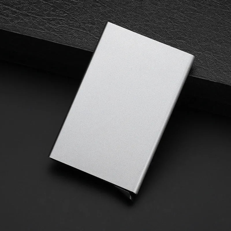 Aluminum geometric business card holder in six colours with stainless steel construction showing compact dimensions