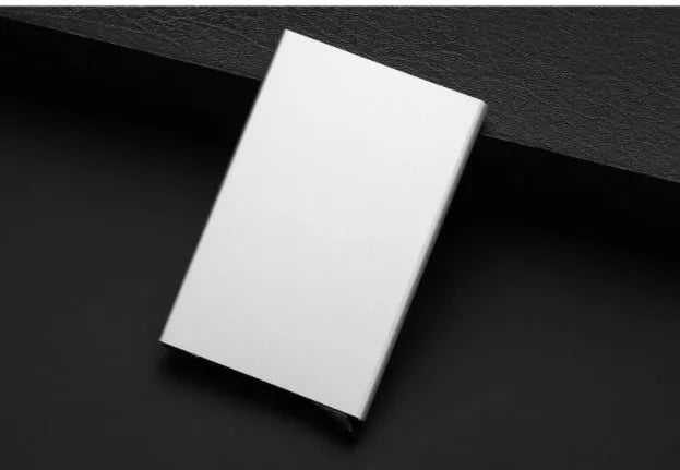 Aluminum geometric business card holder in six colours with stainless steel construction showing compact dimensions