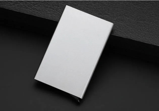 Aluminum geometric business card holder in six colours with stainless steel construction showing compact dimensions