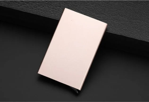 Aluminum geometric business card holder in six colours with stainless steel construction showing compact dimensions