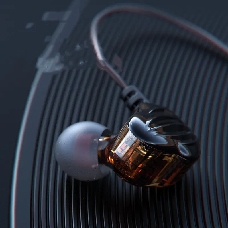 Black in-ear sports headphones with around-ear cable fit and a 3.5mm plug, shown with red and white colour options.